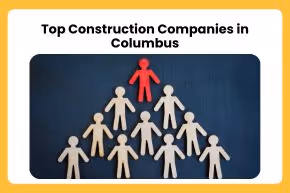 Paper cutout figures arranged in a pyramid with one red figure on top, symbolizing leadership among top construction companies in Columbus.